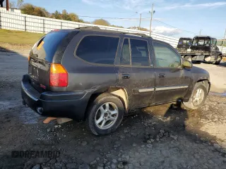 2003 GMC Envoy SLE with VIN 1GKDS13S632136015, listed as a Copart auction lot 79969194 with Not Provided miles and Clean Title. Bid and sale history available at DreamBid. Image 3.
