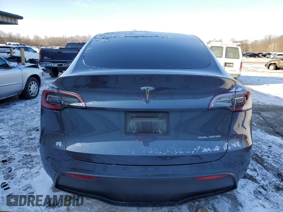 2023 Tesla Model Y Long Range with VIN 7SAYGDEE6PF752570, listed as a Copart auction lot 84927794 with 52,297 mi miles and Salvage Title. Bid and sale history available at DreamBid. Image 6.