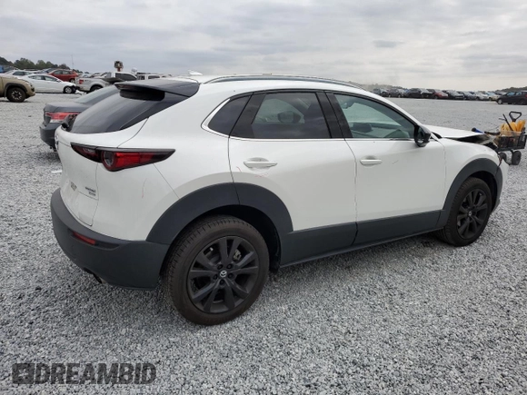 2021 Mazda CX-30 Premium with VIN 3MVDMBDY3MM254756, listed as a Copart auction lot 78054944 with 28,010 mi miles and Salvage Title. Bid and sale history available at carsss.com. Image 3.