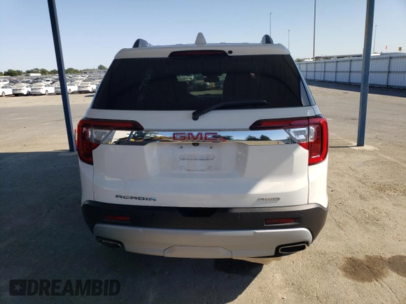2020 GMC Acadia SLT with VIN 1GKKNULS4LZ165889, listed as a Copart auction lot 63130585 with 39,254 mi miles and Salvage title. Bid and sale history available at DreamBid. Image 6.