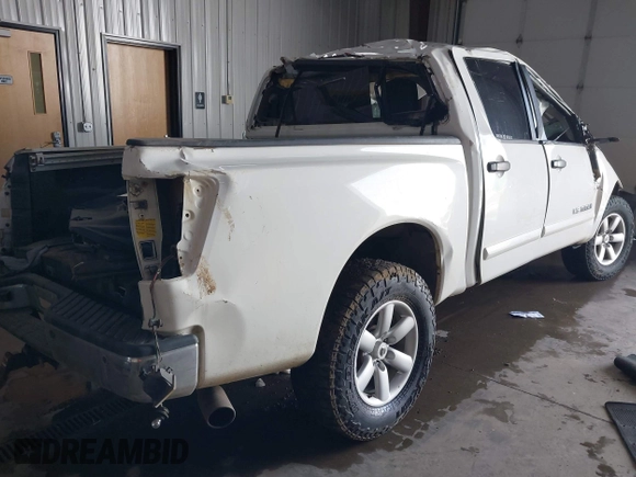 2013 Nissan Titan Pro-4X with VIN 1N6BA0EC7DN311469, listed as a IAAI auction lot 41945284 with 88,225 mi miles and . Bid and sale history available at DreamBid. Image 4.