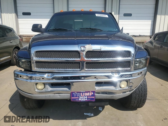 2000 Dodge 2500 z VIN 1B7KF2369YJ131193, wystawiony jako Copart lot #64900694 z przebiegiem 270 394 mil mil oraz Szkoda całkowita • Salvage title. Historia ofert i sprzedaży dostępna na DreamBid. Obrazek 5.