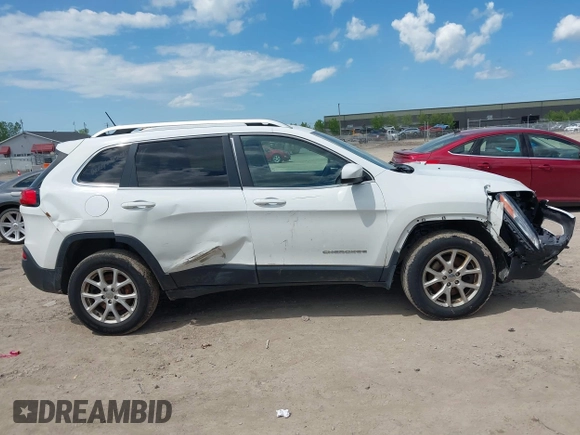 2015 Jeep Cherokee Latitude z VIN 1C4PJMCS3FW557734, wystawiony jako IAAI lot #42273937 z przebiegiem 168 828 mil mil oraz . Historia ofert i sprzedaży dostępna na DreamBid. Obrazek 13.