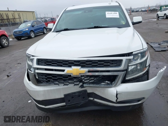 2016 Chevrolet Tahoe LT with VIN 1GNSKBKC6GR462856, listed as a IAAI auction lot 41687980 with 113,161 mi miles and . Bid and sale history available at DreamBid. Image 12.