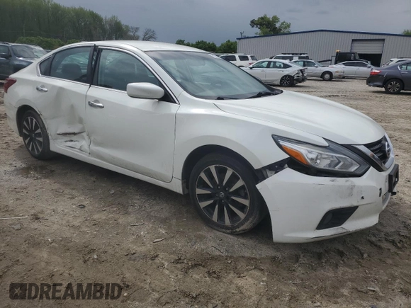 2018 Nissan Altima SV with VIN 1N4AL3AP9JC177614, listed as a Copart auction lot 52033385 with 216,463 mi miles and Clean Title. Bid and sale history available at DreamBid. Image 4.