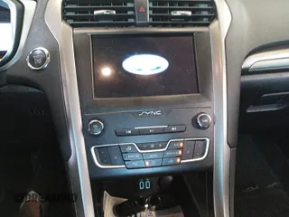 2020 Ford Fusion SE with VIN 3FA6P0T95LR177041, listed as a IAAI auction lot 42844576 with 76,312 mi miles and . Bid and sale history available at DreamBid. Image 1.