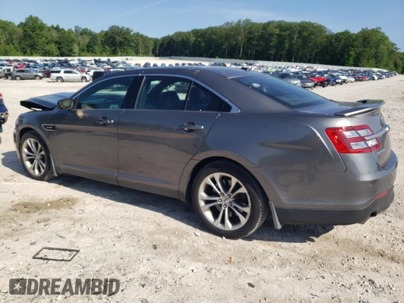 2013 Ford Taurus SHO with VIN 1FAHP2KT9DG139953, listed as a Copart auction lot 60977295 with 196,162 mi miles and Clean title. Bid and sale history available at DreamBid. Image 2.