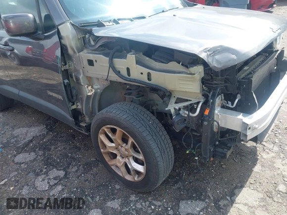 2017 Jeep Renegade Latitude with VIN ZACCJBBB2HPE49710, listed as a IAAI auction lot 42473831 with 57,114 mi miles and . Bid and sale history available at DreamBid. Image 6.