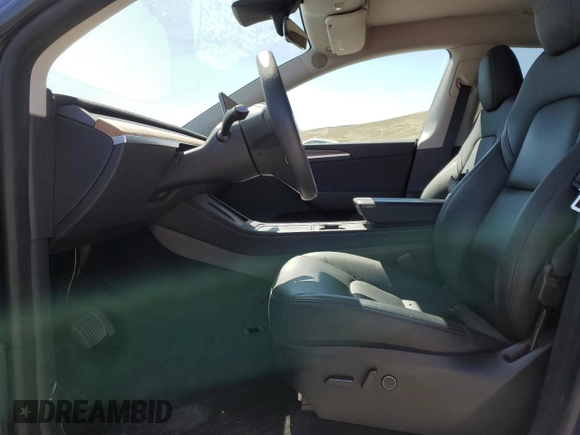 2023 Tesla Model Y Long Range with VIN 7SAYGDEE3PA106609, listed as a Copart auction lot 53839315 with 24,077 mi miles and Salvage Title. Bid and sale history available at DreamBid. Image 7.