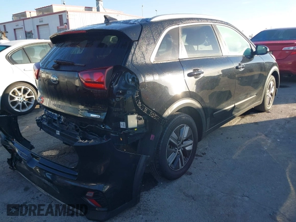 2021 Kia Niro LX with VIN KNDCB3LC3M5464553, listed as a IAAI auction lot 41100627 with 124,353 mi miles. Bid and sale history available at carsss.com. Image 4.