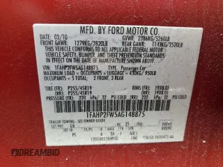 2010 Ford Taurus Limited z VIN 1FAHP2FW5AG148875, wystawiony jako Copart lot #59106595 z przebiegiem 218 500 mil mil oraz Szkoda całkowita • Salvage title. Historia ofert i sprzedaży dostępna na DreamBid. Obrazek 12.