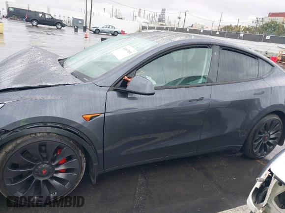 2023 Tesla Model Y Performance with VIN 7SAYGDEF0PF774282, listed as a IAAI auction lot 41807031 with Not Provided miles and . Bid and sale history available at DreamBid. Image 13.