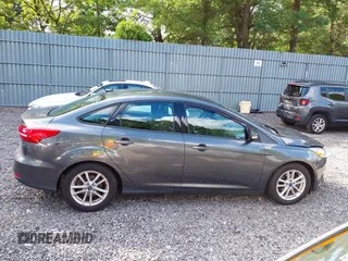 2018 Ford Focus SE z VIN 1FADP3FE0JL284107, wystawiony jako IAAI lot #42815845 z przebiegiem 110 155 mil mil oraz . Historia ofert i sprzedaży dostępna na DreamBid. Obrazek 13.