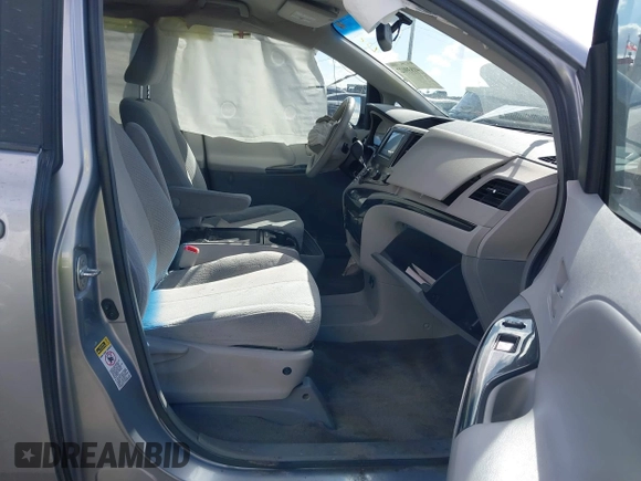 2012 Toyota Sienna LE AAS with VIN 5TDKK3DC1CS264239, listed as a IAAI auction lot 41839022 with 221,769 mi miles. Bid and sale history available at carsss.com. Image 5.