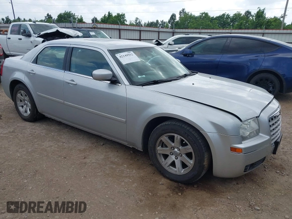 2006 Chrysler 300 Touring with VIN 2C3KA53GX6H113815, listed as a IAAI auction lot 42149912 with 144,813 mi miles. Bid and sale history available at carsss.com. Image 1.