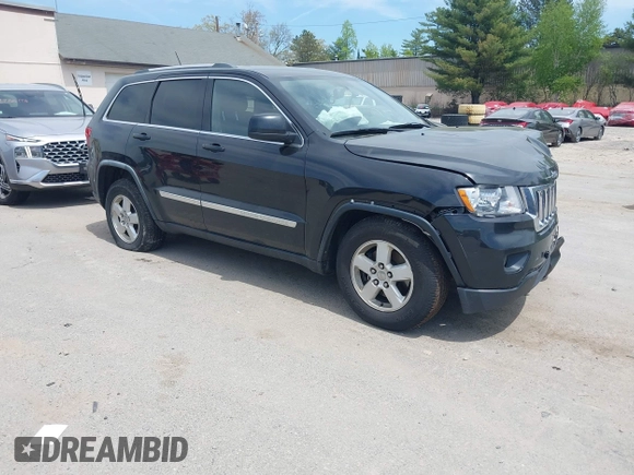 2011 Jeep Grand Cherokee Laredo z VIN 1J4RR4GG0BC547689, wystawiony jako IAAI lot #42230005 z przebiegiem 192 361 mil mil oraz . Historia ofert i sprzedaży dostępna na DreamBid. Obrazek 1.