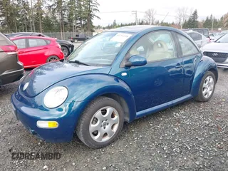 2002 Volkswagen New Beetle Coupe GLS with VIN 3VWCD21C52M427614, listed as a IAAI auction lot 41754238 with 194,718 mi miles. Bid and sale history available at carsss.com. Image 2.