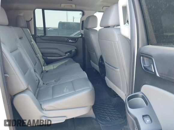 2018 Chevrolet Suburban LT with VIN 1GNSKHKC5JR104240, listed as a IAAI auction lot 41892859 with Not Provided miles and . Bid and sale history available at DreamBid. Image 8.