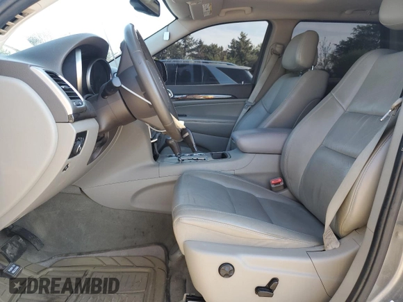 2011 Jeep Grand Cherokee Laredo with VIN 1J4RR4GGXBC642759, listed as a Copart auction lot 55767575 with 144,104 mi miles and Salvage title. Bid and sale history available at DreamBid. Image 7.