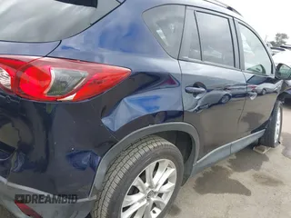 2014 Mazda CX-5 Grand Touring with VIN JM3KE2DY1E0307911, listed as a IAAI auction lot 42064898 with 133,934 mi miles. Bid and sale history available at carsss.com. Image 18.