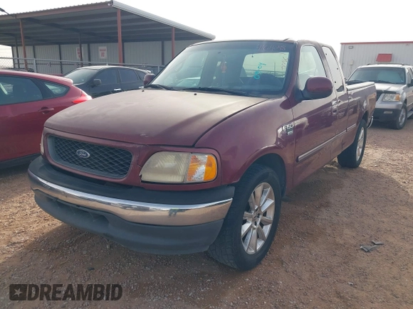 1998 Ford F-150 with VIN 1FTZX17WXWKB63416, listed as a IAAI auction lot 41604048 with 214,890 mi miles and . Bid and sale history available at DreamBid. Image 2.