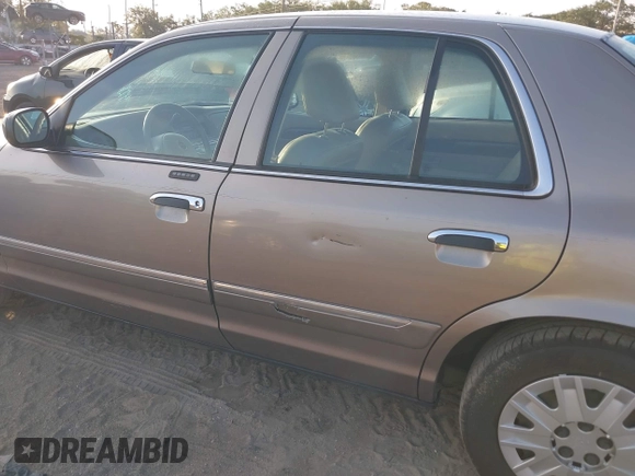 2004 Mercury Grand Marquis GS with VIN 2MEFM74WX4X696703, listed as a IAAI auction lot 42171970 with 149,556 mi miles and . Bid and sale history available at DreamBid. Image 6.