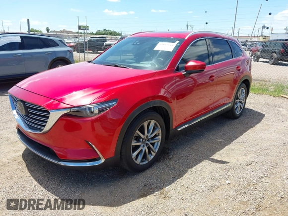 2017 Mazda CX-9 Grand Touring z VIN JM3TCADY3H0140895, wystawiony jako IAAI lot #42817948 z przebiegiem 125 288 mil mil oraz . Historia ofert i sprzedaży dostępna na DreamBid. Obrazek 2.