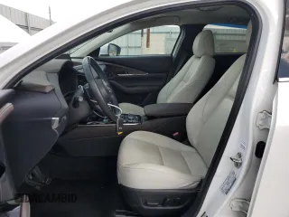 2021 Mazda CX-30 Premium z VIN 3MVDMADM5MM228747, wystawiony jako Copart lot #51747475 z przebiegiem 13 562 mil mil oraz Nie do naprawy • Non repairable. Historia ofert i sprzedaży dostępna na DreamBid. Obrazek 7.