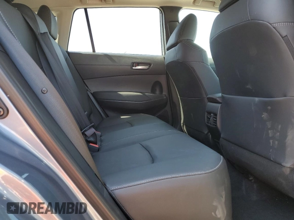 2023 Toyota Corolla Cross XLE with VIN 7MUDAAAG0PV063242, listed as a Copart auction lot 52511585 with 10,695 mi miles and Salvage title. Bid and sale history available at DreamBid. Image 11.