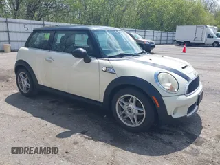 2007 MINI Hardtop S with VIN WMWMF73567TT84033, listed as a IAAI auction lot 42189573 with 75,177 mi miles and . Bid and sale history available at DreamBid. Image 1.