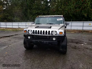 2003 Hummer H2 with VIN 5GRGN23U73H111109, listed as a Copart auction lot 76388144 with 160,179 mi miles and Salvage Title. Bid and sale history available at carsss.com. Image 11.