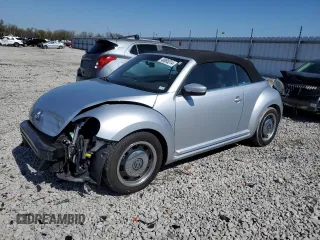 2015 Volkswagen Beetle 1.8T with VIN 3VW517AT8FM810709, listed as a Copart auction lot 48065314 with 61,924 mi miles and Salvage Title. Bid and sale history available at DreamBid. Image 1.