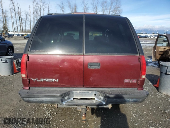 1998 GMC Yukon with VIN 1GKEK13R4WJ719517, listed as a Copart auction lot 44651715 with 230,062 mi miles and Clean Title. Bid and sale history available at carsss.com. Image 6.