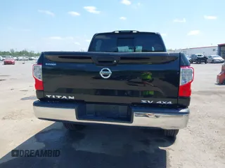 2018 Nissan Titan SV with VIN 1N6AA1EJ4JN529655, listed as a IAAI auction lot 42051405 with 153,599 mi miles and . Bid and sale history available at DreamBid. Image 16.