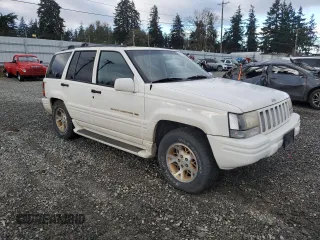 1997 Jeep Grand Cherokee Limited with VIN 1J4GZ78Y7VC772292, listed as a Copart auction lot 87692445 with 0 mi miles and Salvage Title. Bid and sale history available at carsss.com. Image 4.