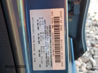 2017 Mazda 3 Touring z VIN JM1BN1L7XH1102372, wystawiony jako Copart lot #61180195 z przebiegiem 57 606 mil mil oraz Szkoda całkowita • Salvage title. Historia ofert i sprzedaży dostępna na DreamBid. Obrazek 13.