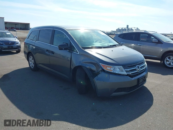 2012 Honda Odyssey LX with VIN 5FNRL5H24CB145694, listed as a IAAI auction lot 41902821 with 134,402 mi miles and . Bid and sale history available at carsss.com. Image 6.