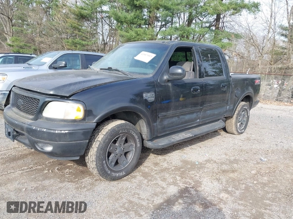 2002 Ford F-150 XLT with VIN 1FTRW08L12KB91777, listed as a IAAI auction lot 42007013 with 192,758 mi miles. Bid and sale history available at carsss.com. Image 2.