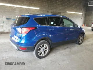 2017 Ford Escape SE z VIN 1FMCU9GD4HUD17066, wystawiony jako Copart lot #60504105 z przebiegiem 64 570 mil mil oraz Szkoda całkowita • Salvage title. Historia ofert i sprzedaży dostępna na DreamBid. Obrazek 3.