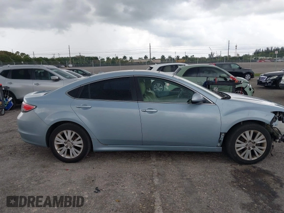 2009 Mazda 6 i Touring with VIN 1YVHP82AX95M19535, listed as a IAAI auction lot 41987285 with 129,111 mi miles and . Bid and sale history available at carsss.com. Image 14.