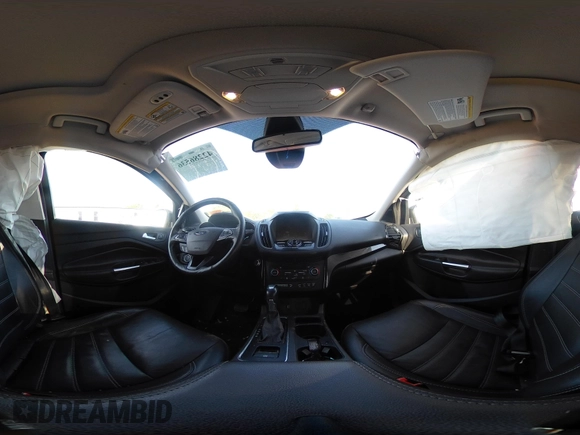 2018 Ford Escape Titanium with VIN 1FMCU9J95JUB30803, listed as a IAAI auction lot 42286536 with 63,309 mi miles and . Bid and sale history available at DreamBid. Image 19.
