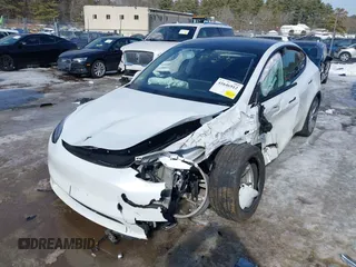 2022 Tesla Model Y Long Range with VIN 7SAYGDEE1NA013066, listed as a IAAI auction lot 41646912 with Not Provided miles and . Bid and sale history available at DreamBid. Image 17.