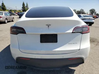 2022 Tesla Model Y Long Range with VIN 7SAYGDEE8NF551850, listed as a Copart auction lot 52747195 with 62,340 mi miles and Salvage Title. Bid and sale history available at carsss.com. Image 6.