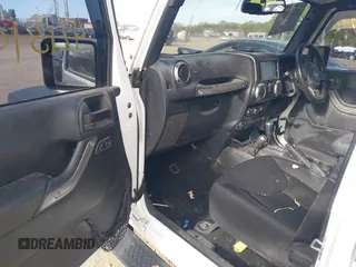 2016 Jeep Wrangler Unlimited Sport RHD with VIN 1C4BJWKG1GL336798, listed as a IAAI auction lot 42134427 with 179,500 mi miles and . Bid and sale history available at DreamBid. Image 5.