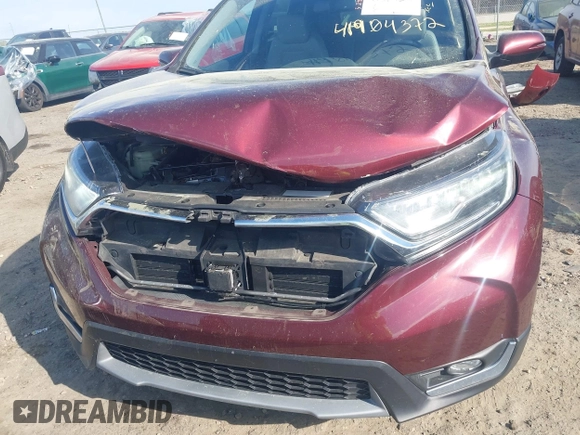 2018 Honda CR-V Touring with VIN 7FARW2H9XJE064414, listed as a IAAI auction lot 41904372 with 88,219 mi miles and . Bid and sale history available at DreamBid. Image 6.