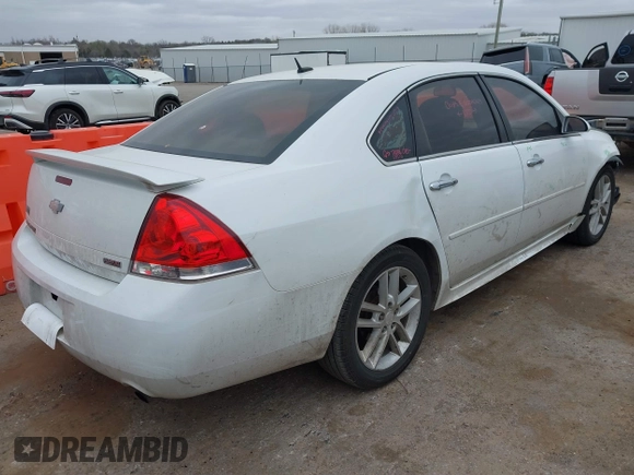 2013 Chevrolet Impala LTZ with VIN 2G1WC5E34D1152402, listed as a IAAI auction lot 41838035 with 214,088 mi miles and . Bid and sale history available at DreamBid. Image 4.