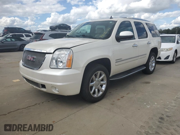 2011 GMC Yukon Denali with VIN 1GKS2EEF8BR367552, listed as a Copart auction lot 74142084 with 151,855 mi miles and Salvage Title. Bid and sale history available at carsss.com. Image 1.