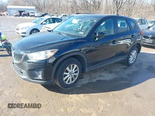 2014 Mazda CX-5 Sport with VIN JM3KE2BE7E0313978, listed as a IAAI auction lot 41437144 with 161,181 mi miles and . Bid and sale history available at carsss.com. Image 17.