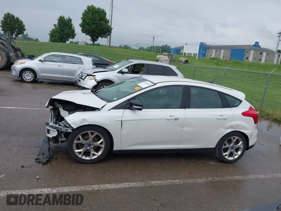 2014 Ford Focus Titanium with VIN 1FADP3N24EL184220, listed as a IAAI auction lot 42429610 with 172,575 mi miles and . Bid and sale history available at DreamBid. Image 15.
