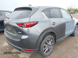 2017 Mazda CX-5 Grand Touring with VIN JM3KFBDL3H0143194, listed as a IAAI auction lot 42049258 with 74,159 mi miles. Bid and sale history available at carsss.com. Image 4.